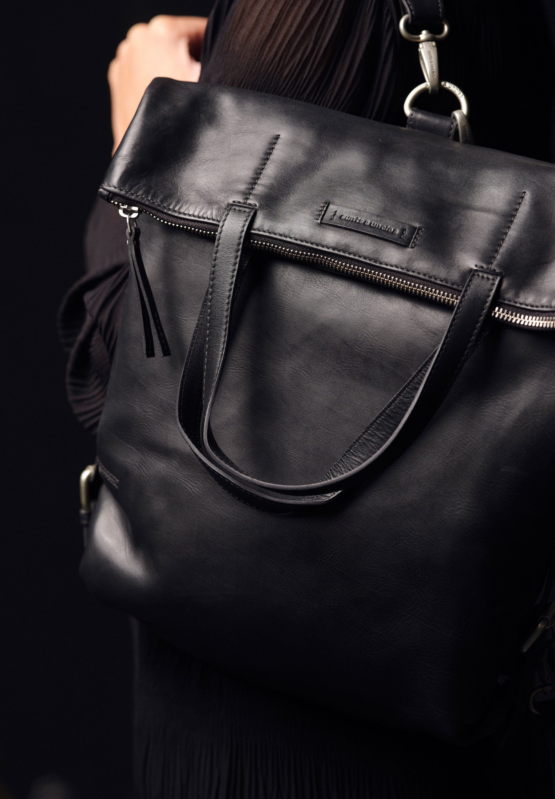 Aunts & Uncles - SS25 - Pomelo Handbag/Backpack in Jet Black - on person 5