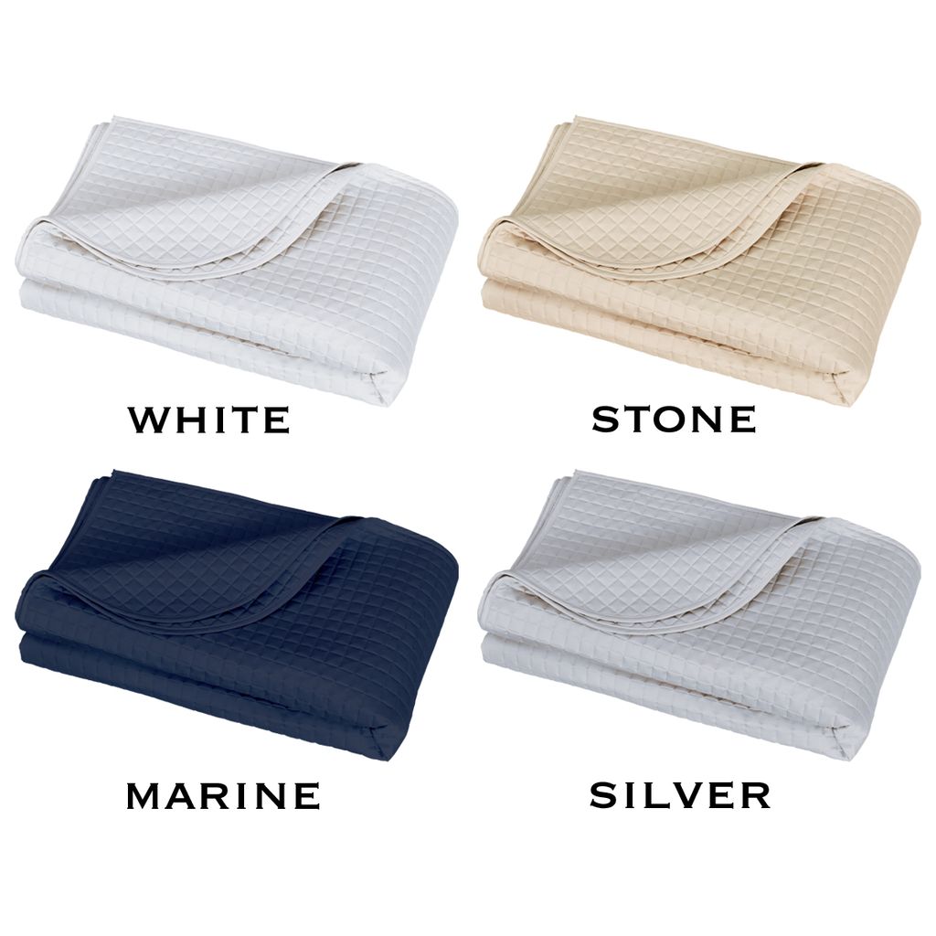 Four folded blankets in white, stone, marine, and silver on a white background.