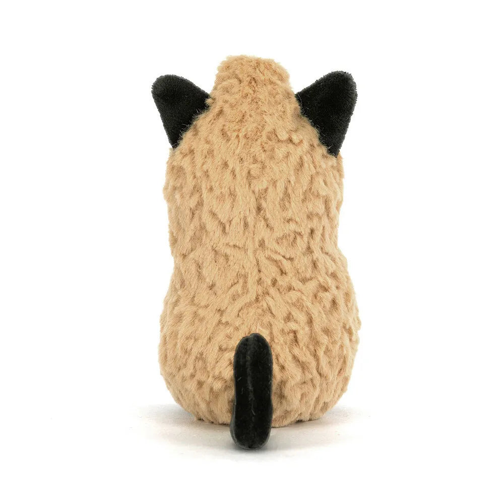 Stuffed peanut toy wearing a cat costume with beige body and black ears and tail on a white background