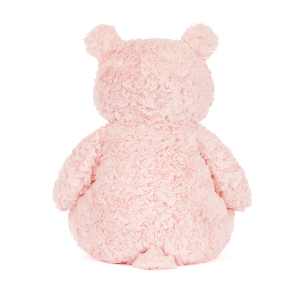 Pink teddy bear plush toy on a white background