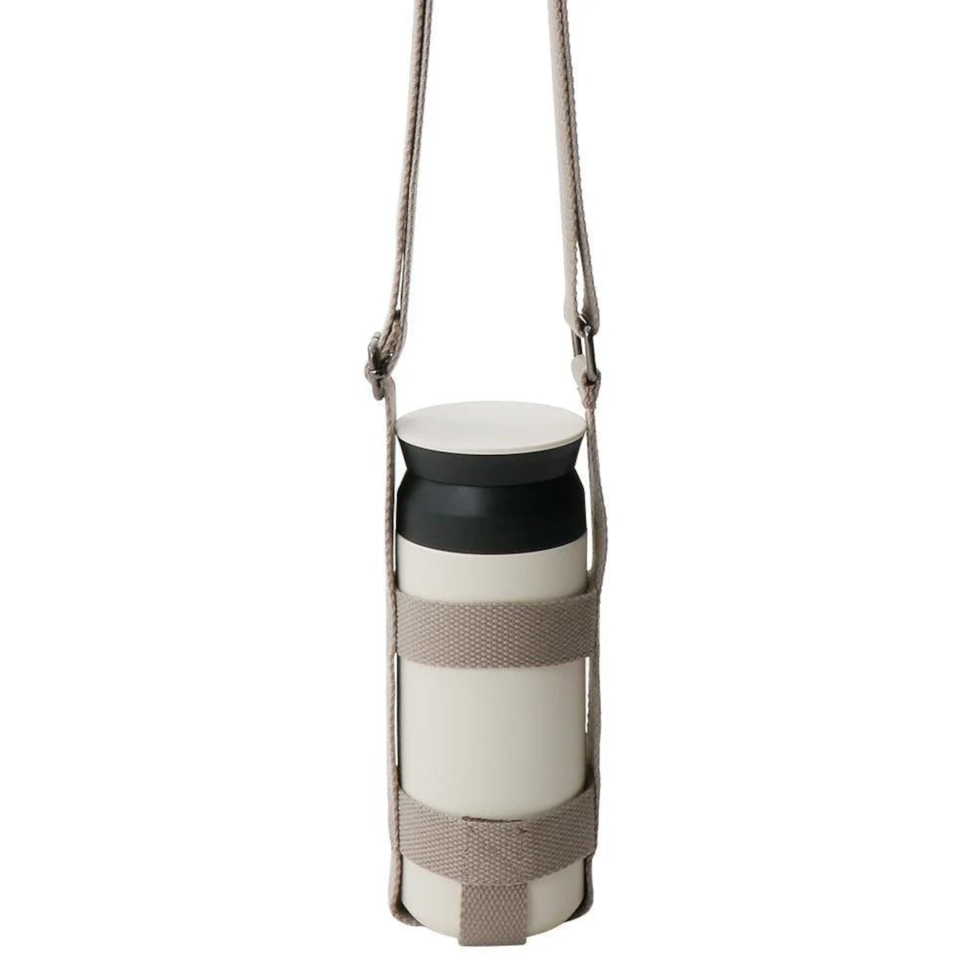 KINTO Tumbler strap medium in Beige holding travel tumbler