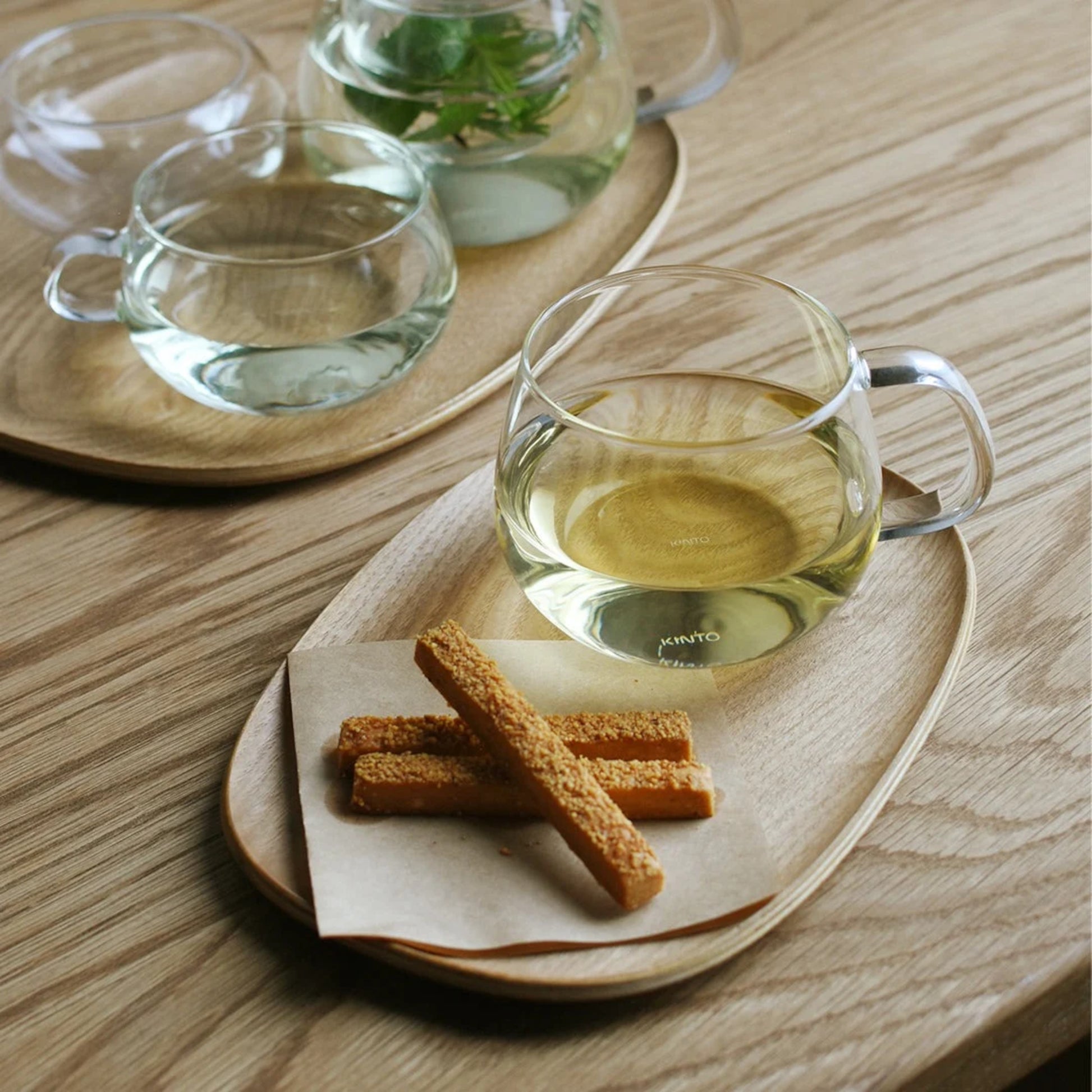 KINTO UNITEA Teacup and Willow Tray with tea and bread sticks