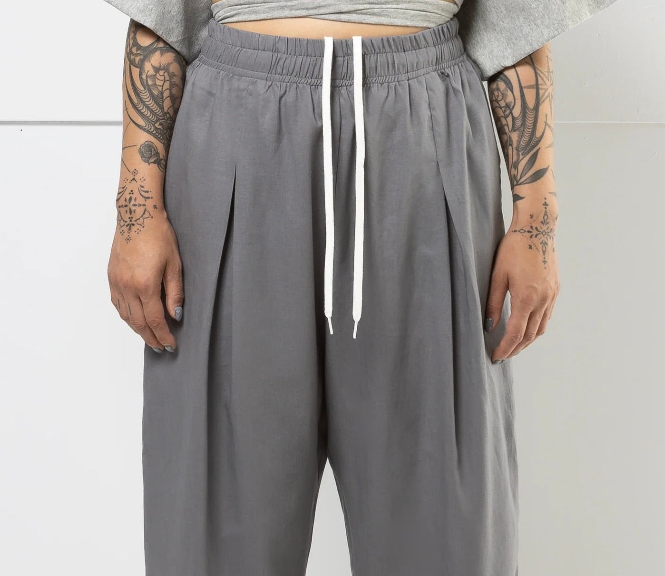 SS25 - Mercy House - Henry Pleated Pant in Light Charcoal - front close up 3