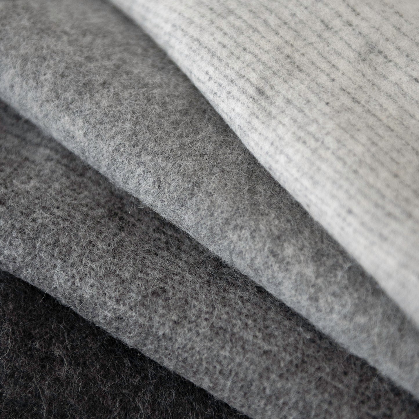 Closeup of St Geneve Aria Throw in Charcoal