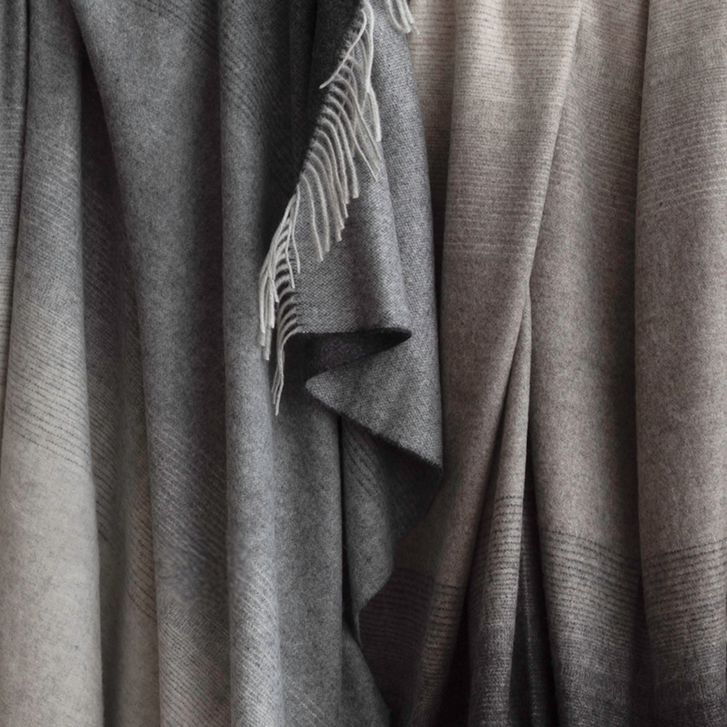 St Geneve Aria Throw Blankets in Charcoal and Crimini