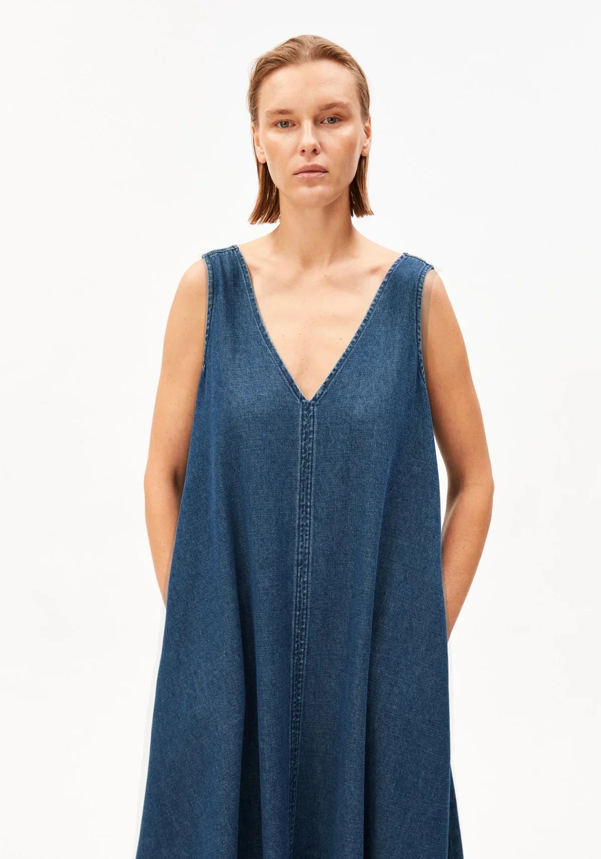 women's ARMEDANGELS Canada Denim V-Neck Midi Dress in Eau, model front medium view in Kelowna