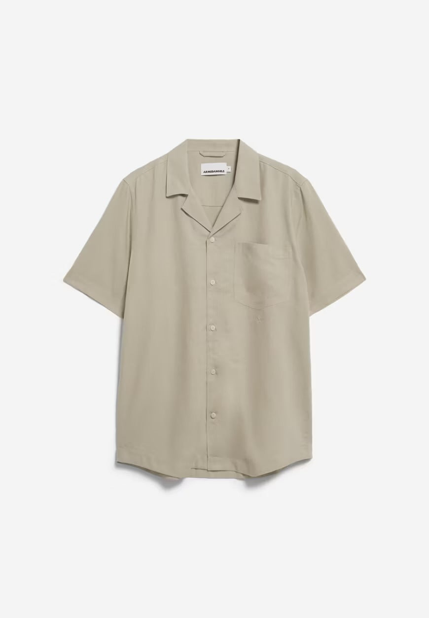 Flat lay of the ARMEDANGELS Canada Lovaar Lino Shirt in sandstone, a short-sleeve camp-collar shirt with a chest pocket, on a white background.