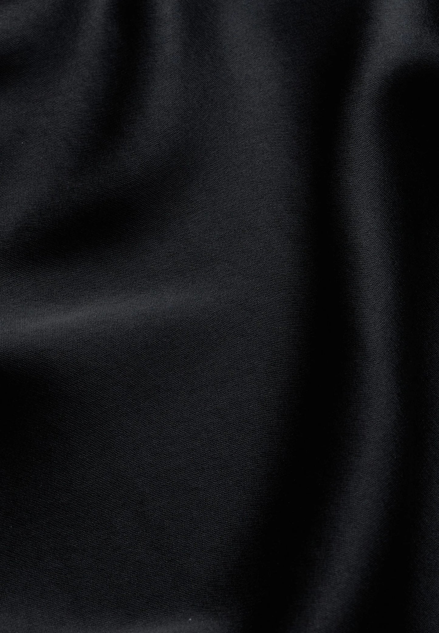 ARMEDANGELS Canada - LENOVAA Satin Slip-Skirt in Black - close-up of black satin fabric