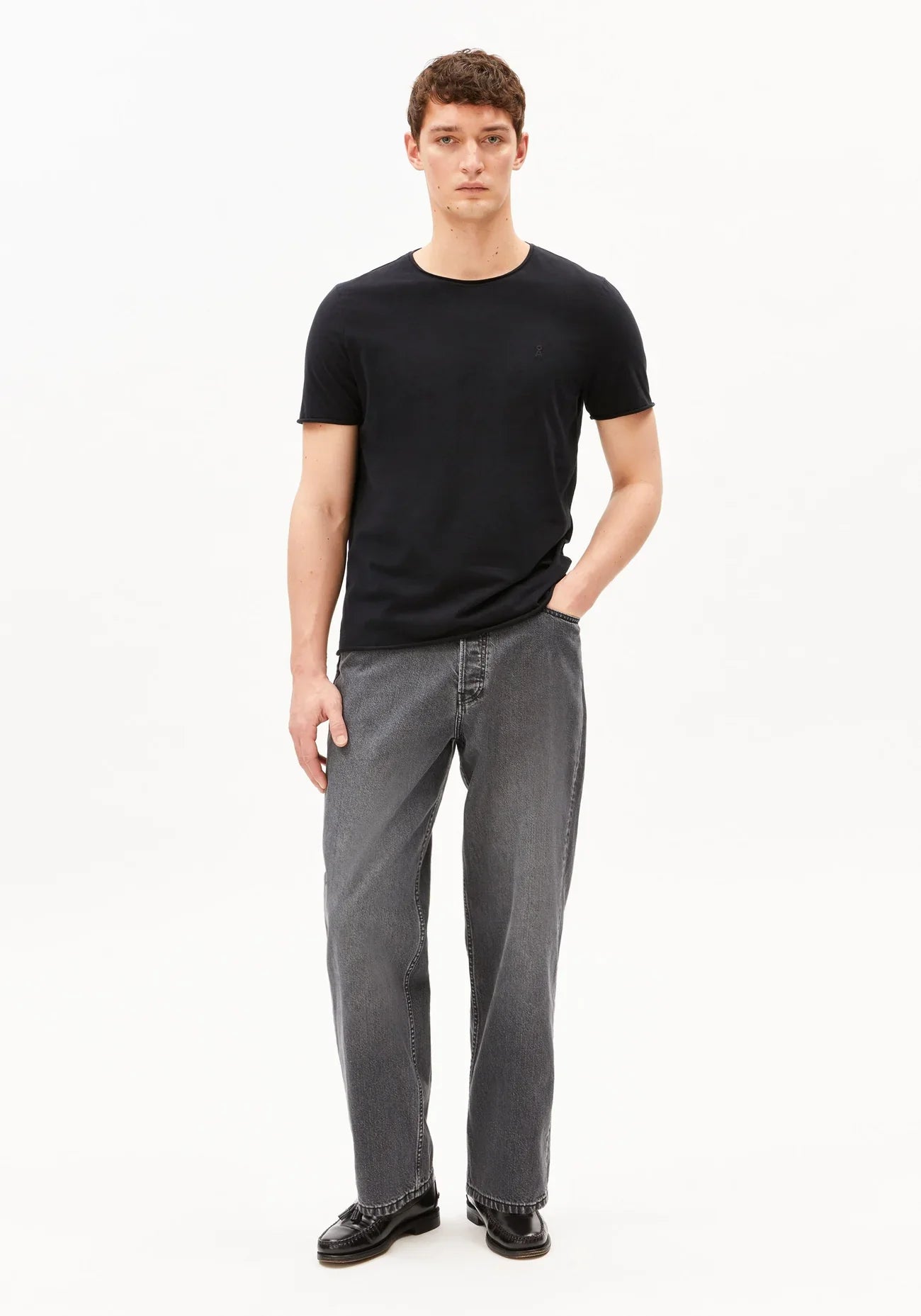 Men's black t-shirt organic cotton JAAMES BRUSHED T-SHIRT in Black - ARMEDANGELS Canada front view on model in Kelowna