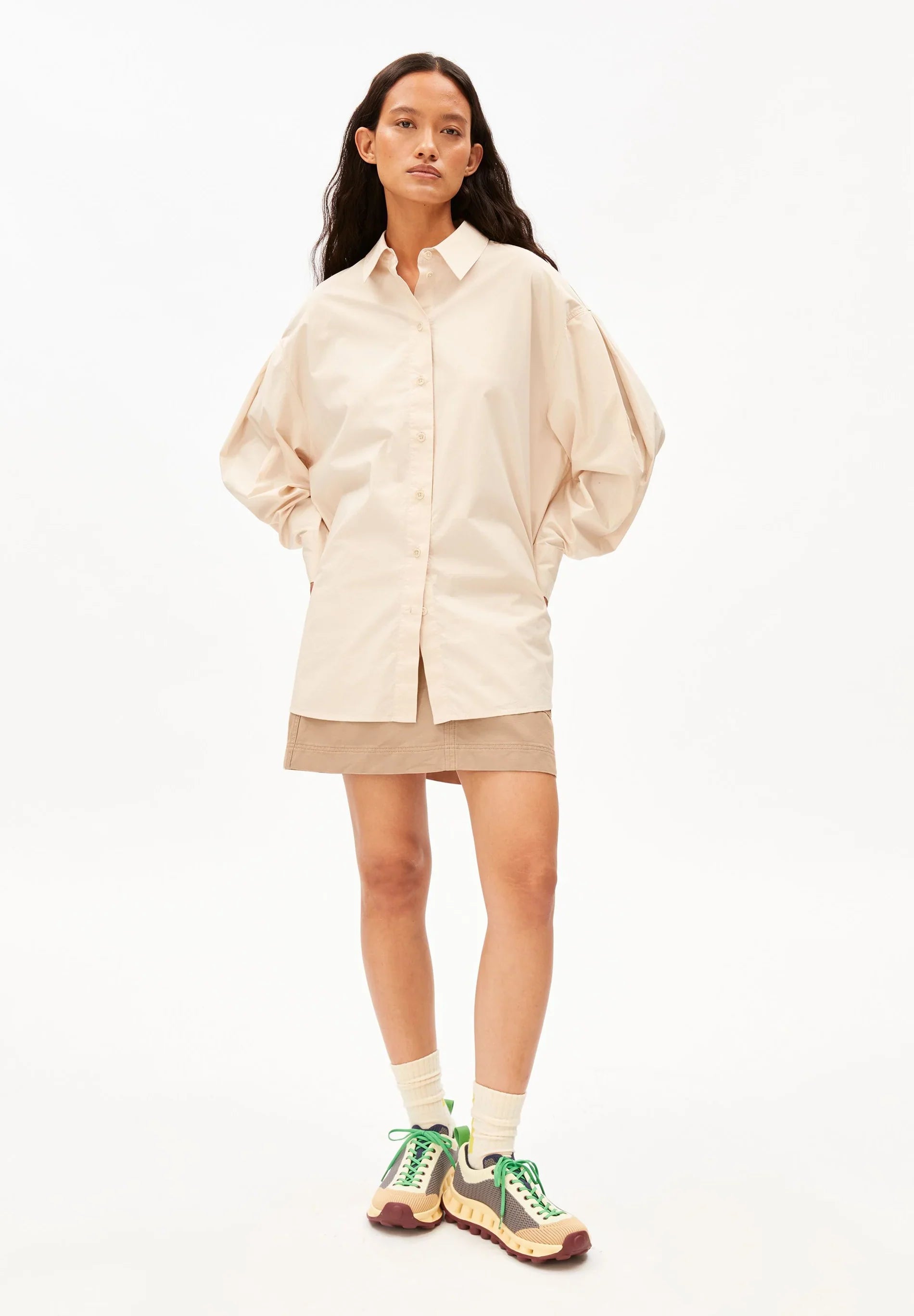 BARREL SLEEVE POPLIN BLOUSE in Pale Peach – ARMEDANGELS front view on model