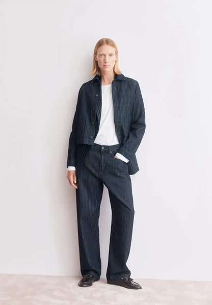 ARMEDANGELS Canada – HAAYI Herringbone Baggy Jean in Rinse paired with matching jacket on model in Kelowna