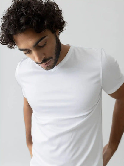 Mos Mosh Gallery V-neck tee in white on model front view at Textile Apparel Kelowna