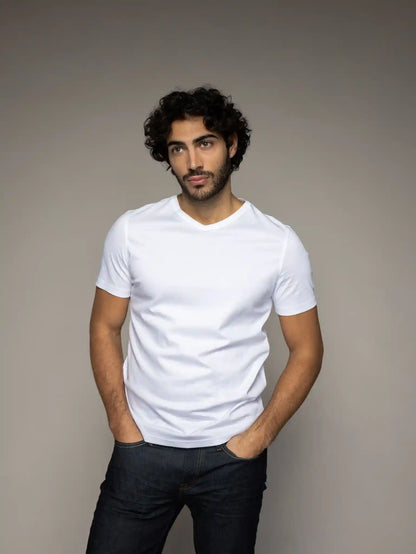 Mos Mosh Gallery V-neck tee in white on model front view at Textile Apparel Kelownam ade from organic cotton
