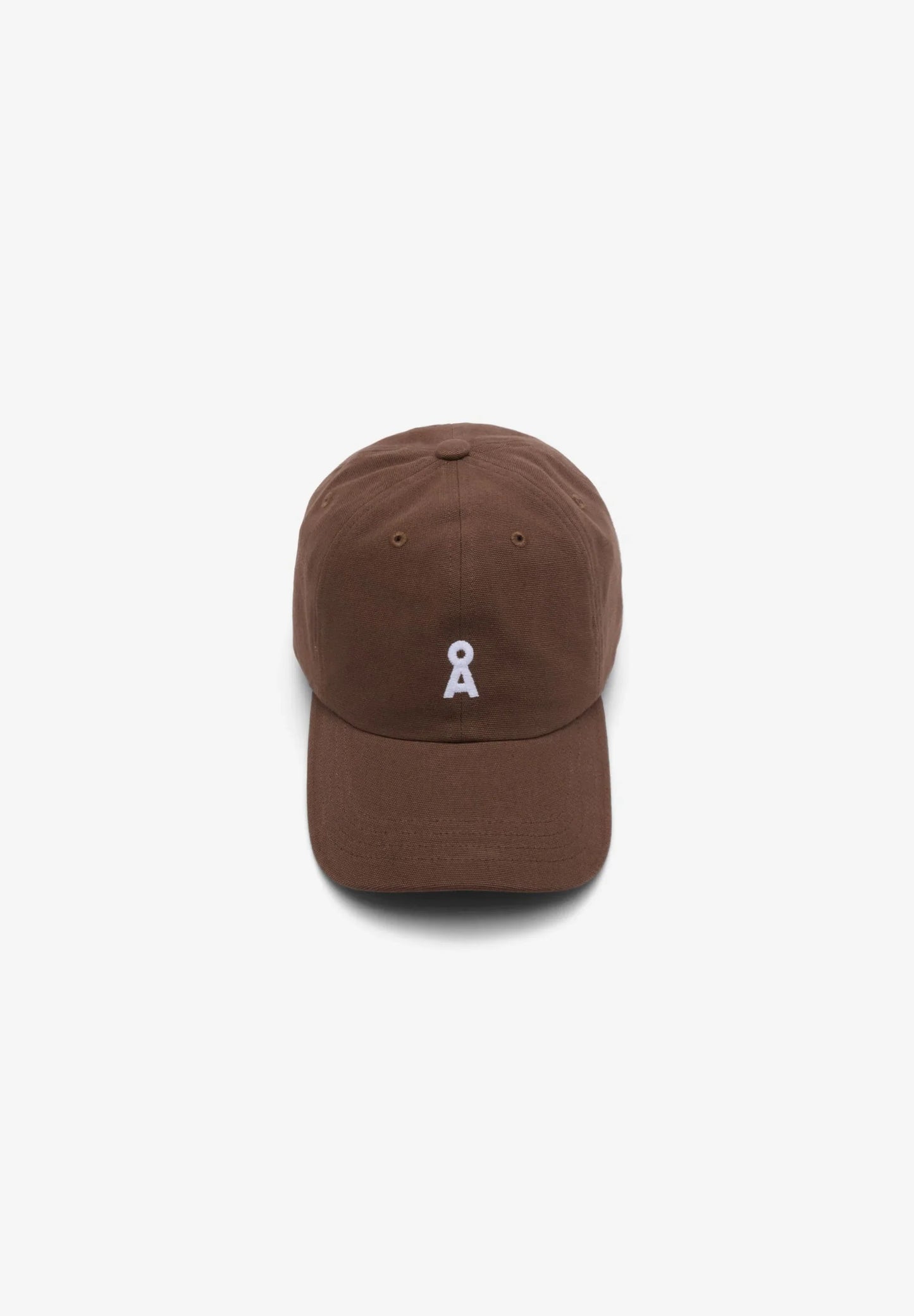 Brown cap with a small white logo on a white background