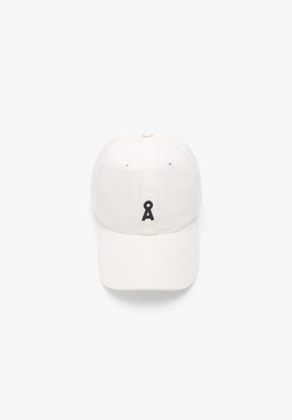 White cap with a black logo on a white background