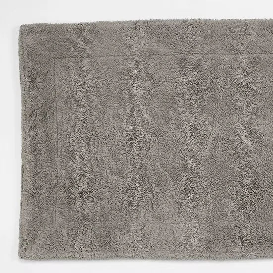 Gray bath mat on a white background