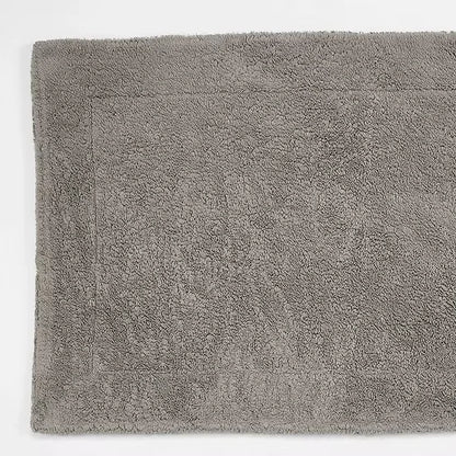 Gray bath mat on a white background