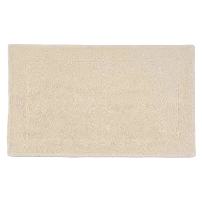 Beige bath mat on a white background