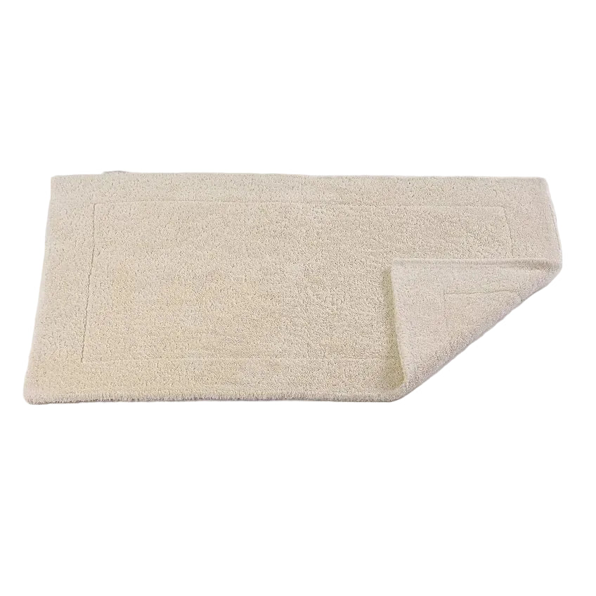 Beige bath mat on a white background