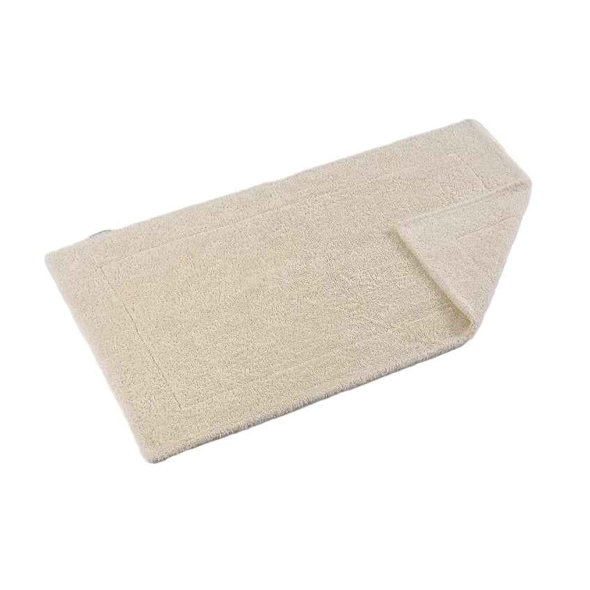 Beige bath mat on a white background