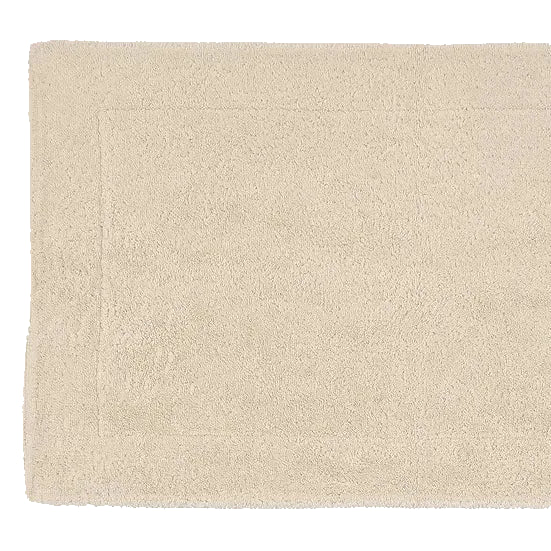Beige bath mat on a white background