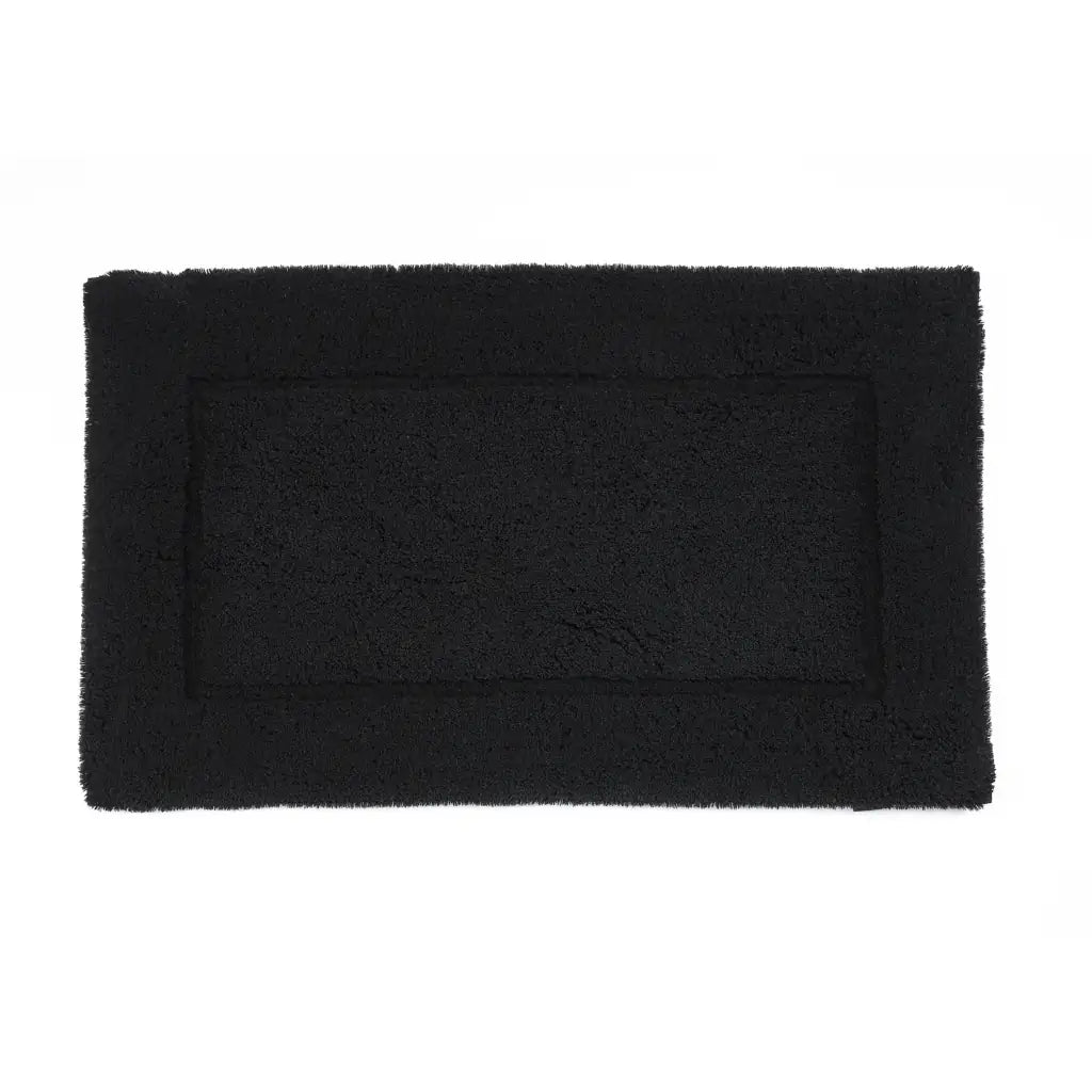 Black rectangular bath mat on a white background