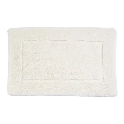 Ivory bath mat on a white background