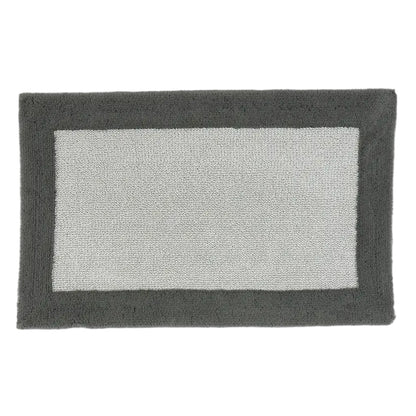 Rectangular bath mat with a dark border on a white background