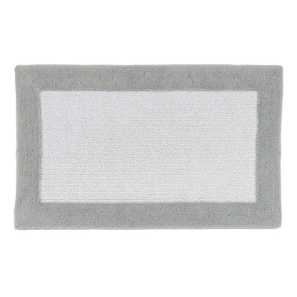 Gray bath mat with white center on a light gray background