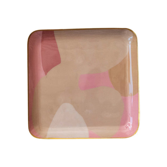 A square enamel metal tray with an abstract pattern in beige and pink colors.