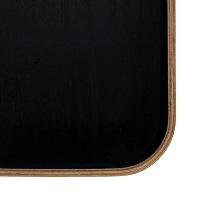 Black tray with wooden border on a white background