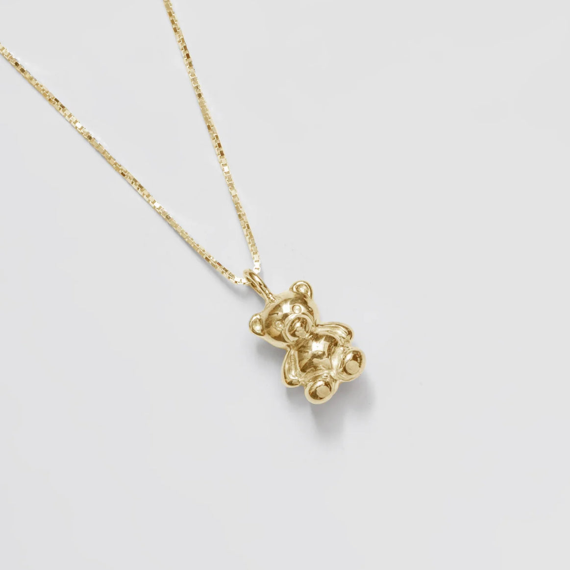 Wolf Circus teddy bear necklace in gold