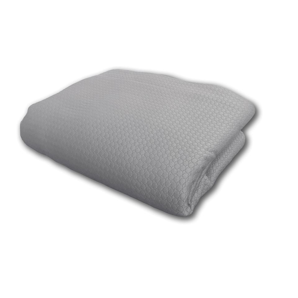Folded gray blanket on a white background