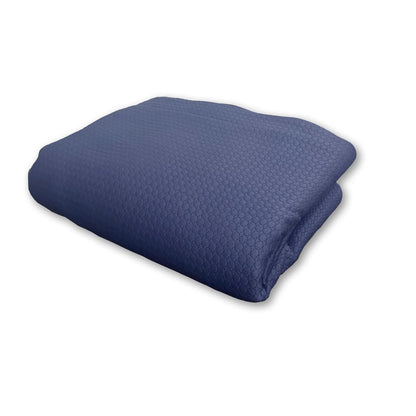 Folded blue blanket on a white background