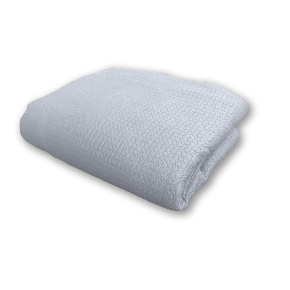 Folded white blanket on a blank background