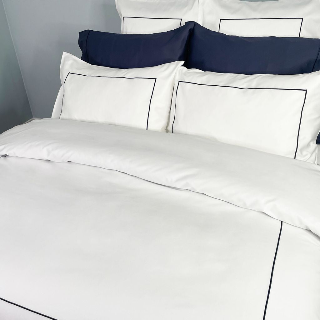 Cuddle Down Renaissance Hotel White Bedding with Marine Stitching Closeup