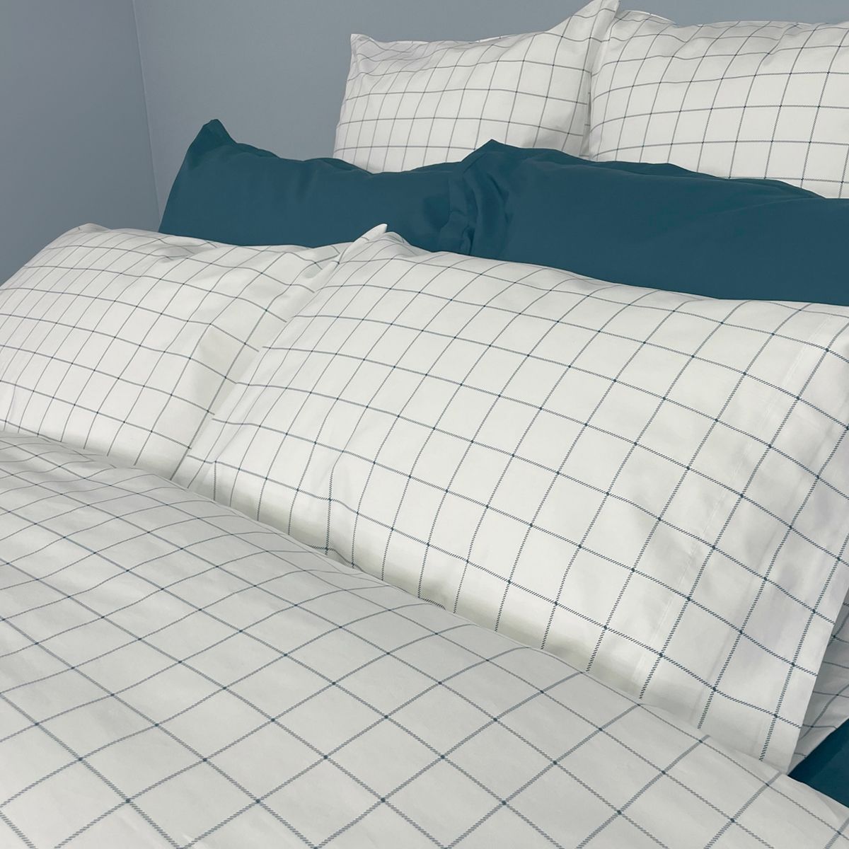 Cuddle Down Tucker Collection Closeup of Pillowcases and Pillow Shams