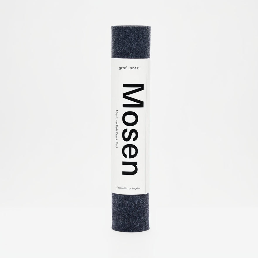 Roll of fabric with 'Mosen' branding on a white background