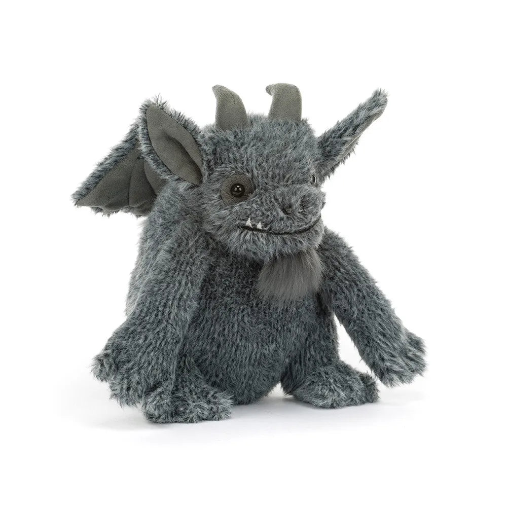 A plush gray gargoyle toy with small horns, folded wings, and a soft furry texture, photographed on a clean white background.