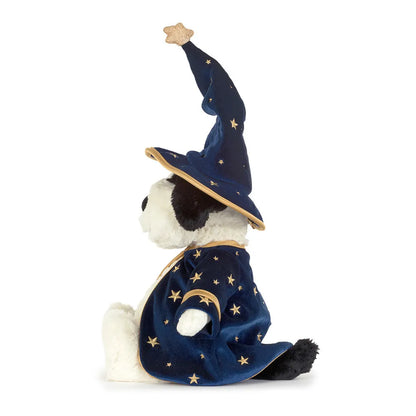 A plush dog stuffed animal dressed as a wizard, featuring a navy blue velvet robe and pointed hat with gold embroidered stars and a crescent moon, set against a plain white background.