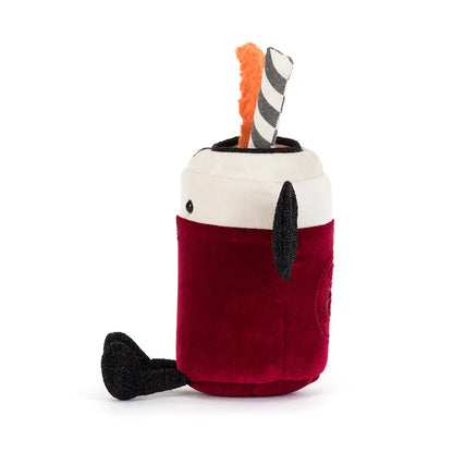 A plush toy shaped like a  vampire cocktail, featuring a deep red body, a cream-colored top, a black handle, and a black-and-white striped straw with an orange loop, shown on a plain white background.
