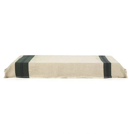 A rectangular beige linen throw with two dark green vertical stripes near the short ends, shown against a plain white background.