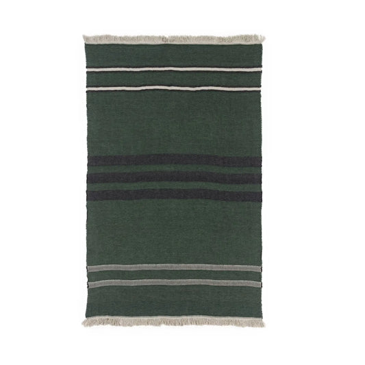 A rectangular linen blanket in dark green with horizontal stripes in black, light gray, and off-white, finished with fringed edges.