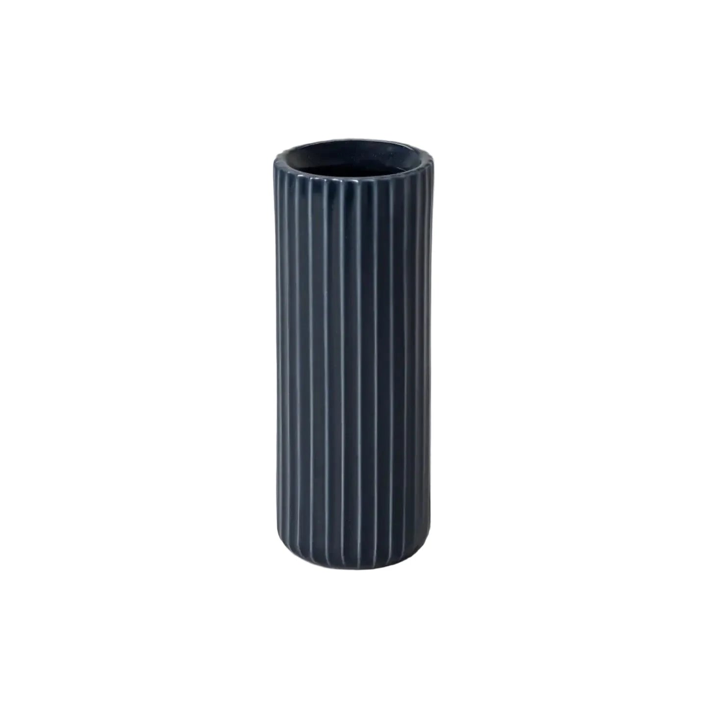 Dark blue cylindrical vase with vertical stripes on a light gray background