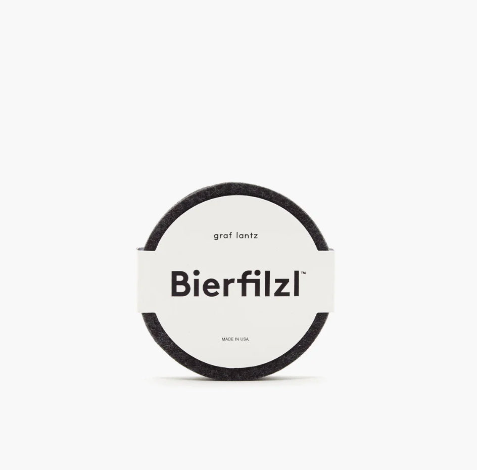 Graf Lantz Merino Wool Round Coasters in Charcoal, in the package