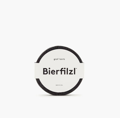 Graf Lantz Merino Wool Round Coasters in Charcoal, in the package