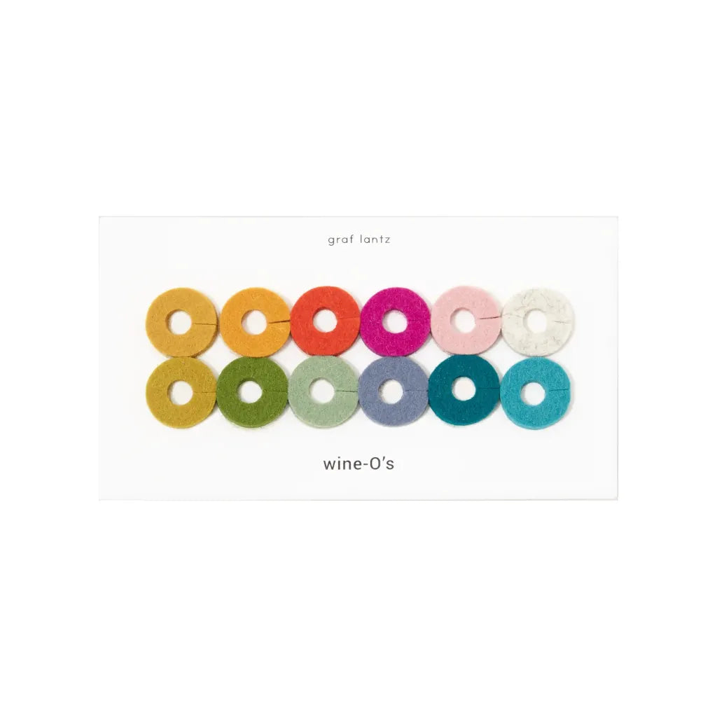 Colourful circular wine markers labelled 'wine-O's' on a white background
