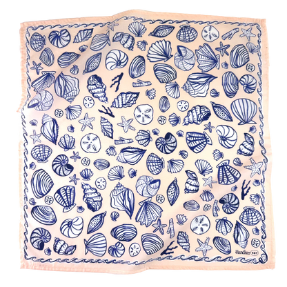 Beige scarf with blue sea shell pattern