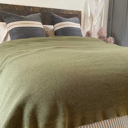 Hawkins New York wool knit throw in an olive colour