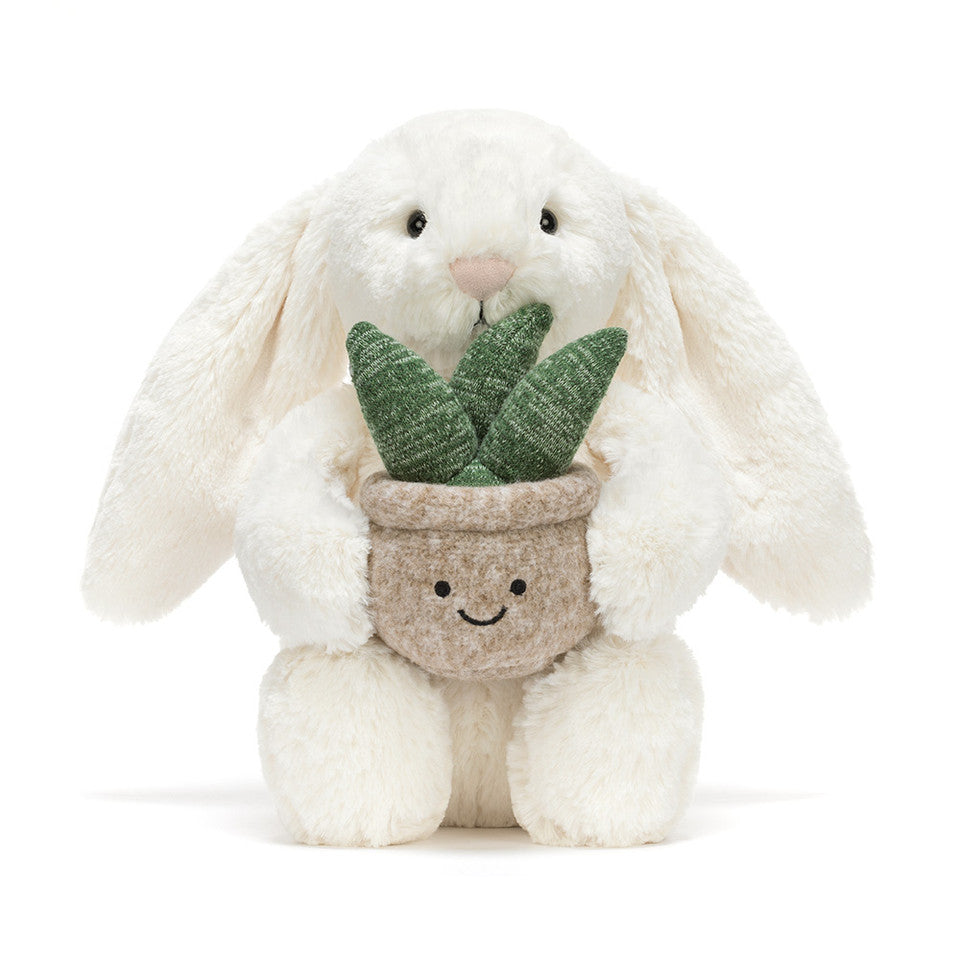 Jellycat bunny holding a plant